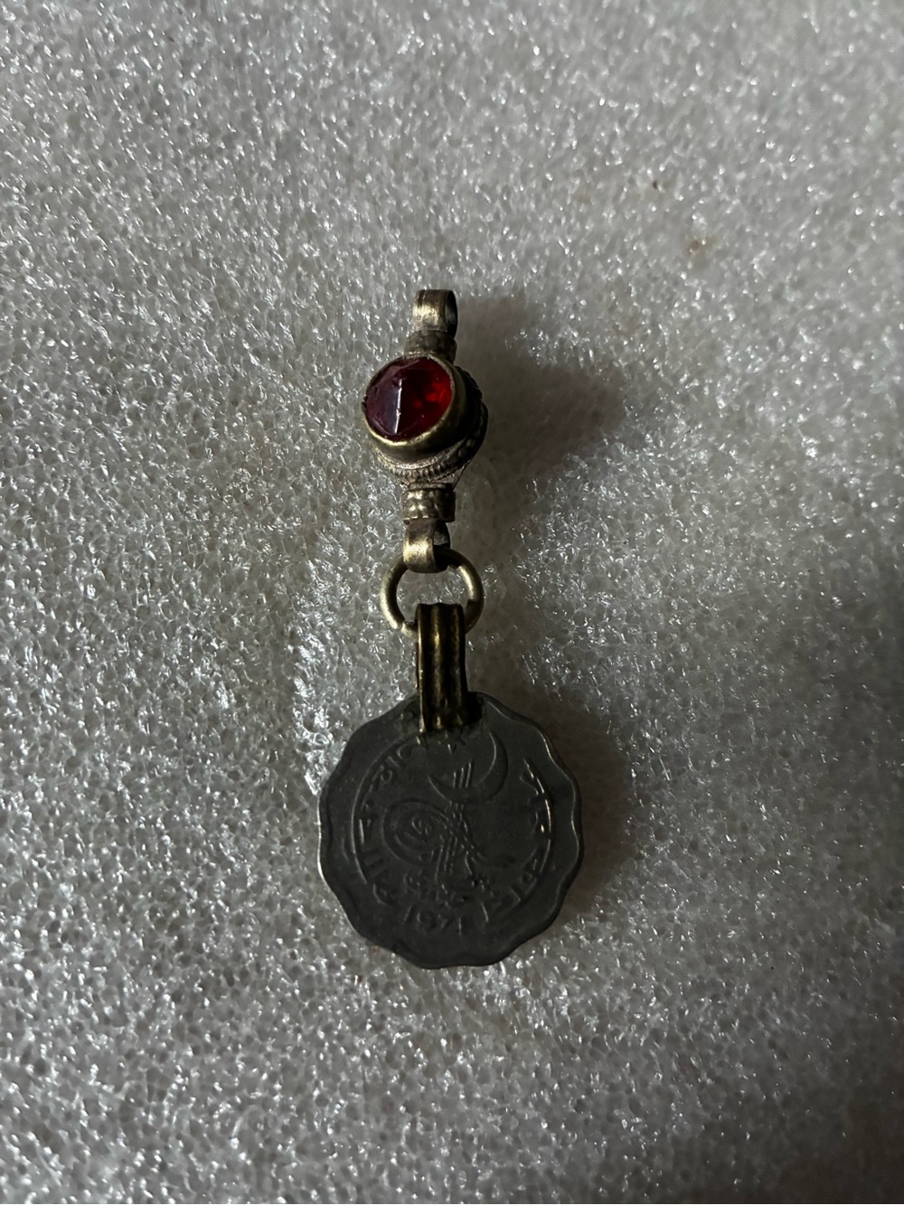 Silver-Tone Coin Pendant with Red Stone Accent